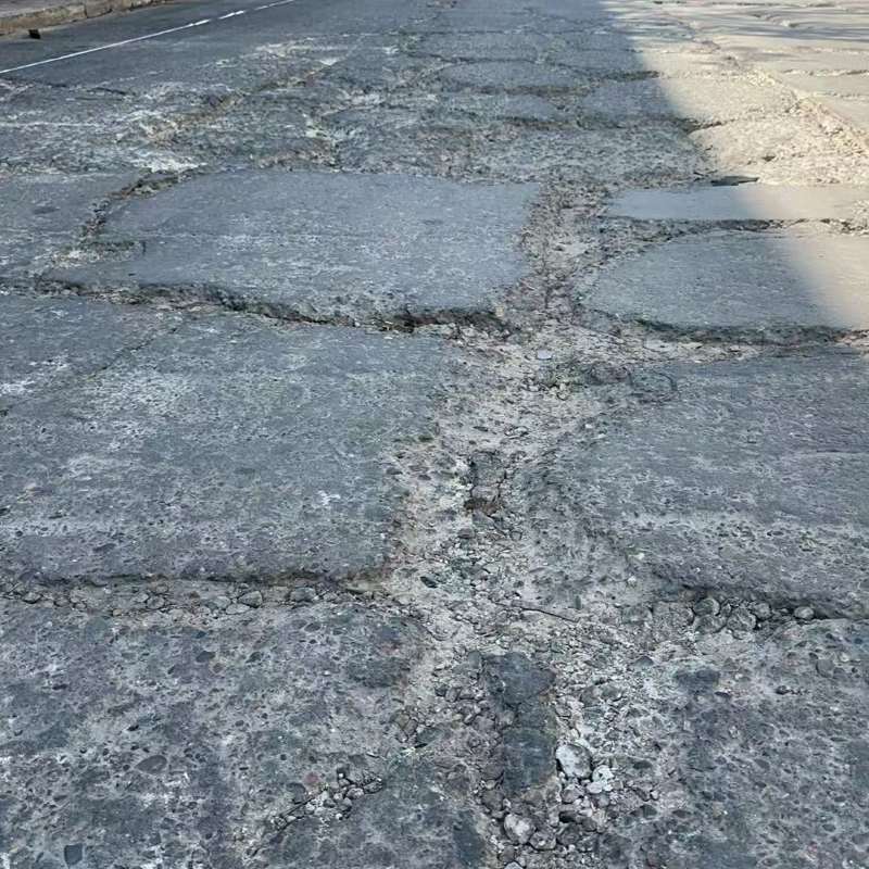 禄丰路面起砂露石子修补料